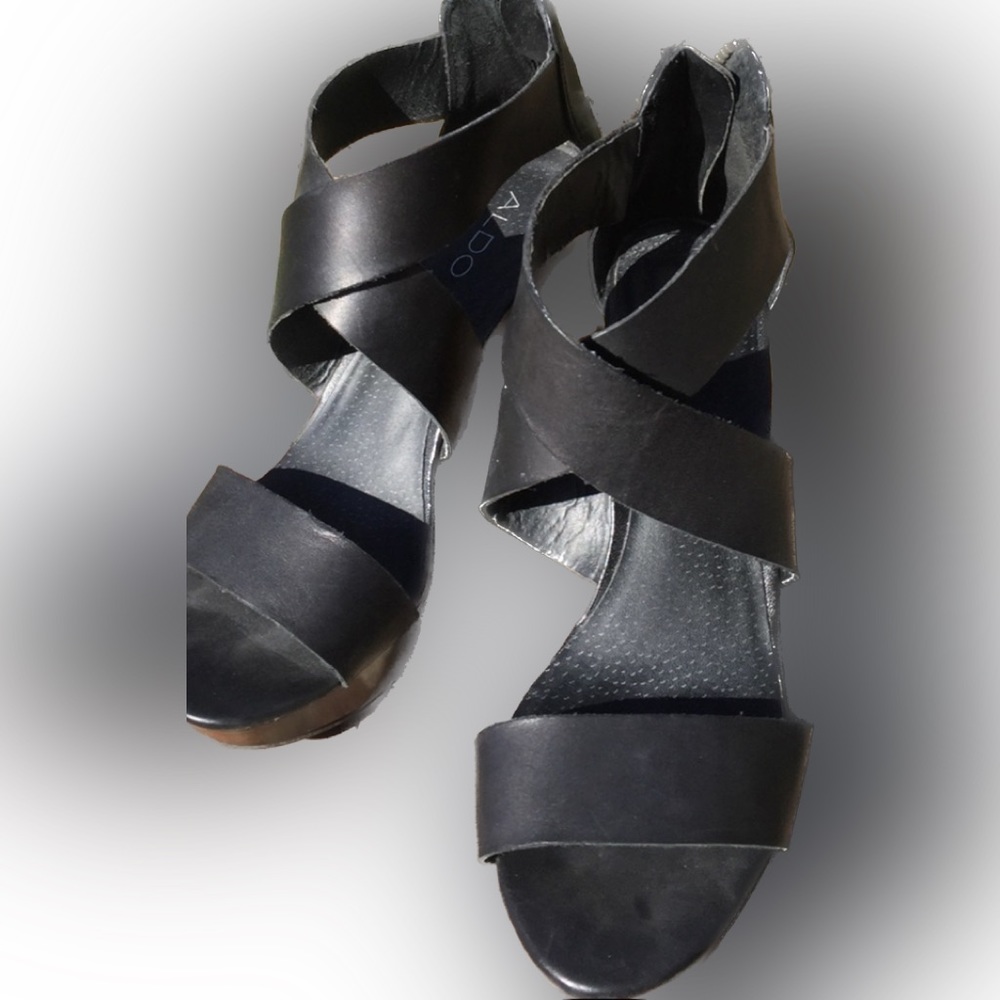 Also black leather wedge sandals